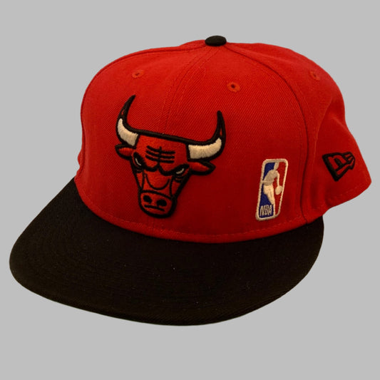 Chicago Bulls Black Letter Snapback Cap a red top with black peak. This has the Bulls and NBA logo on the front